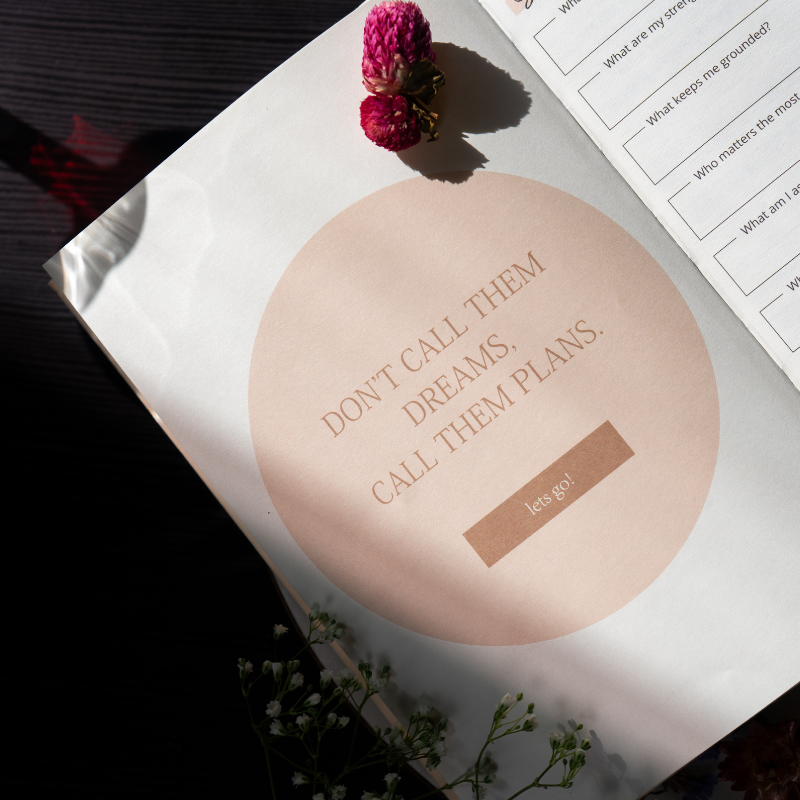 Open Curated by Cice Self-Care Journal with a coffee mug and a sneak peek of the upcoming Mindfulness Notebook.